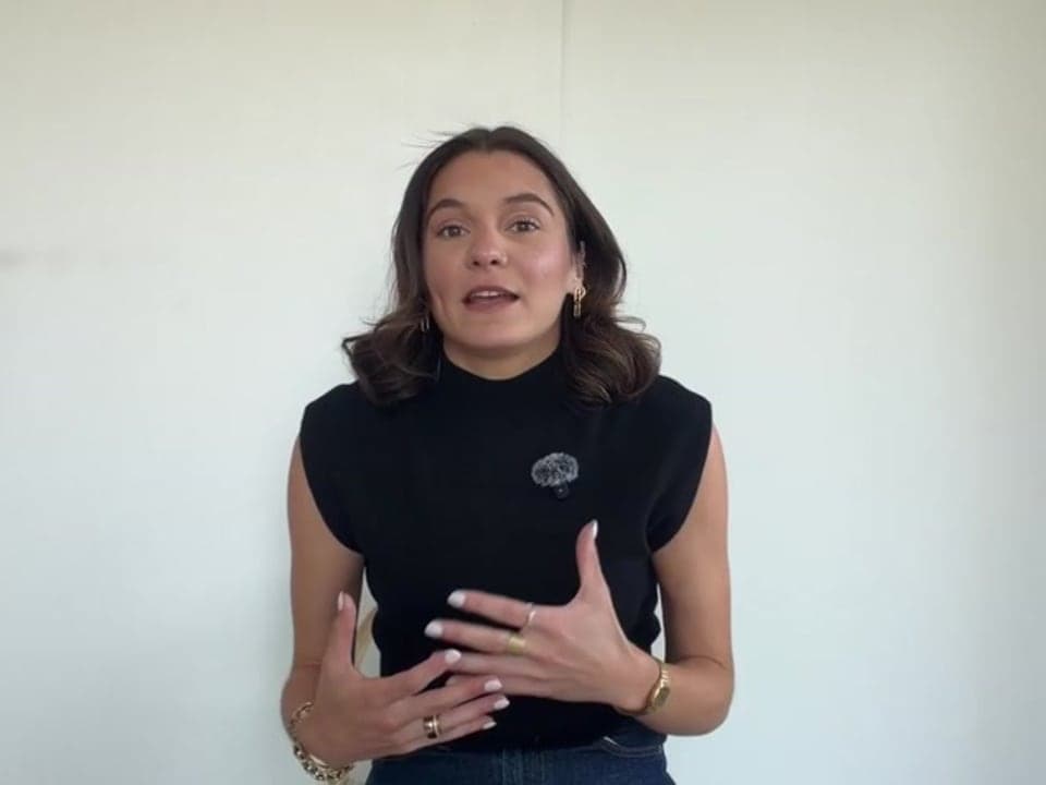 Lauren teaching Reteach on video, in the program